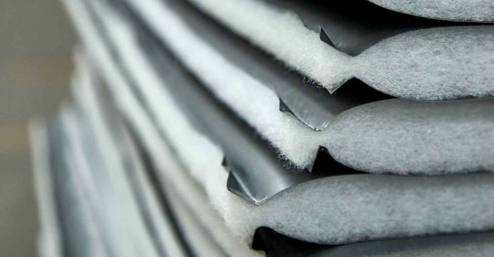 Combitherm termo vintermåtter er den ideelle løsning til afdækning og generel beskyttelse af byggemateriale, når der arbejdes på byggepladsen